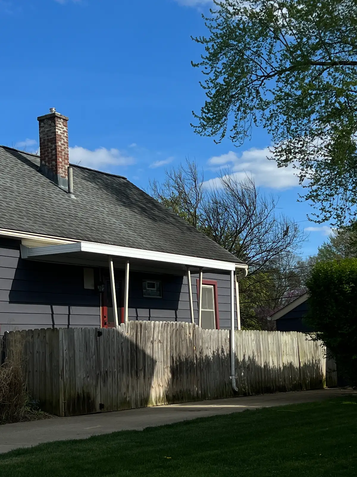 Sunny skies embrace a peaceful neighborhood home. - Westerville, Ohio Still Frame