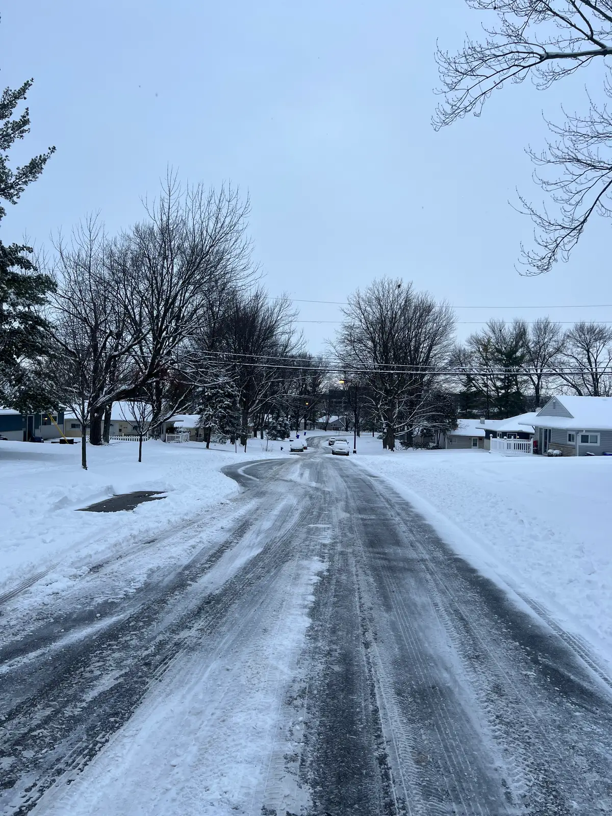 Crisp winter air blankets the sleepy street. Still Frame