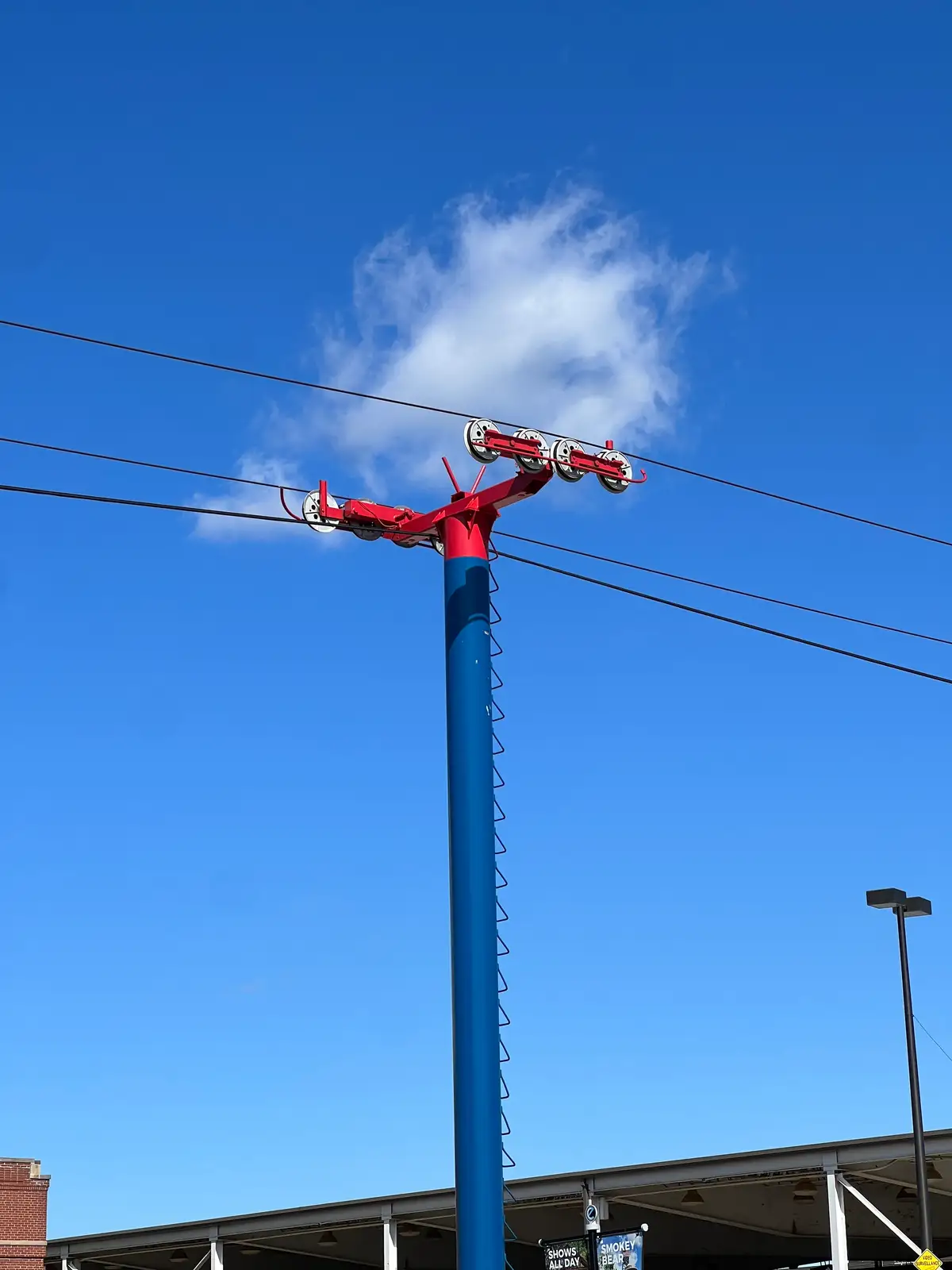 Sky-high support with a cloud for a cap. Still Frame