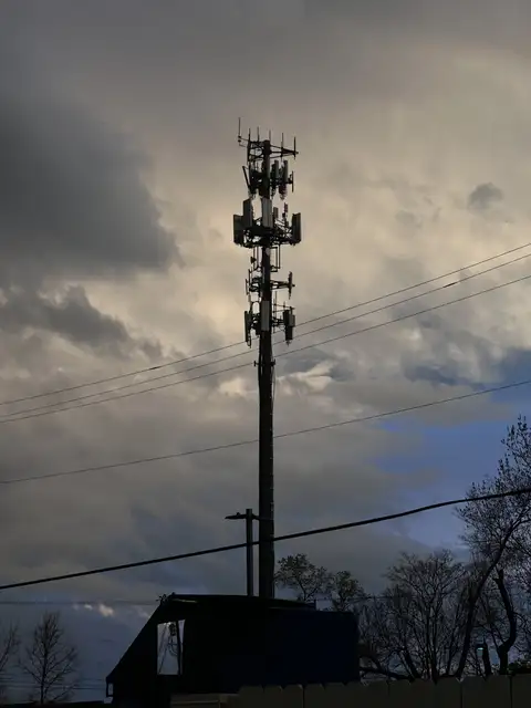 Towering tech against a dramatic sky.