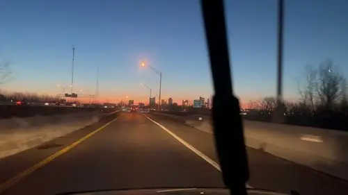 Urban dawn from the highway's heart. - Columbus, Ohio Still Frame