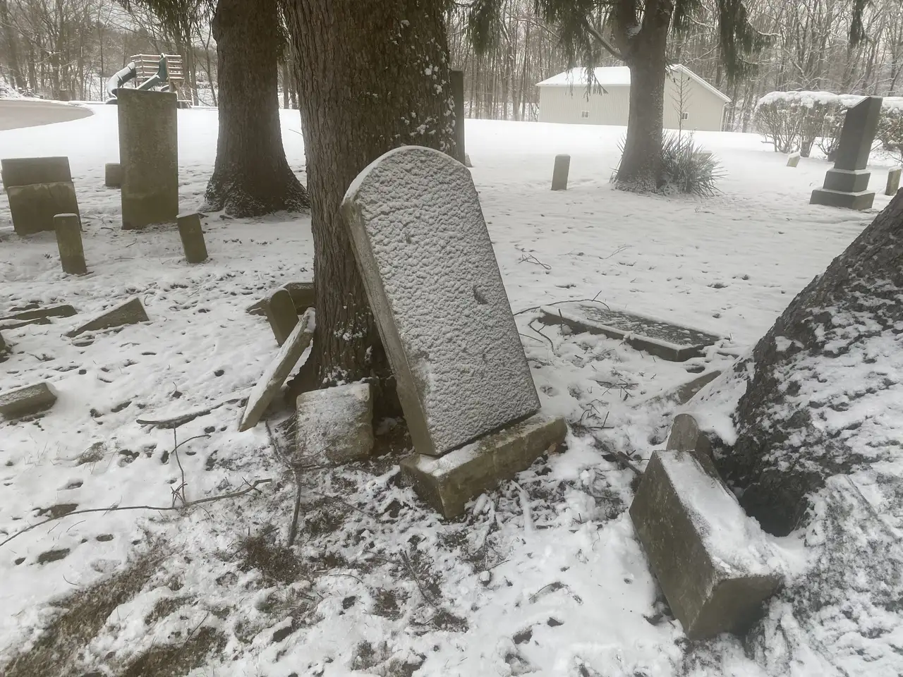 Winter's quiet embrace settles softly on ancient stones. Still Frame