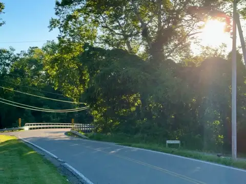 Summer days and sun flares on the winding road ahead.