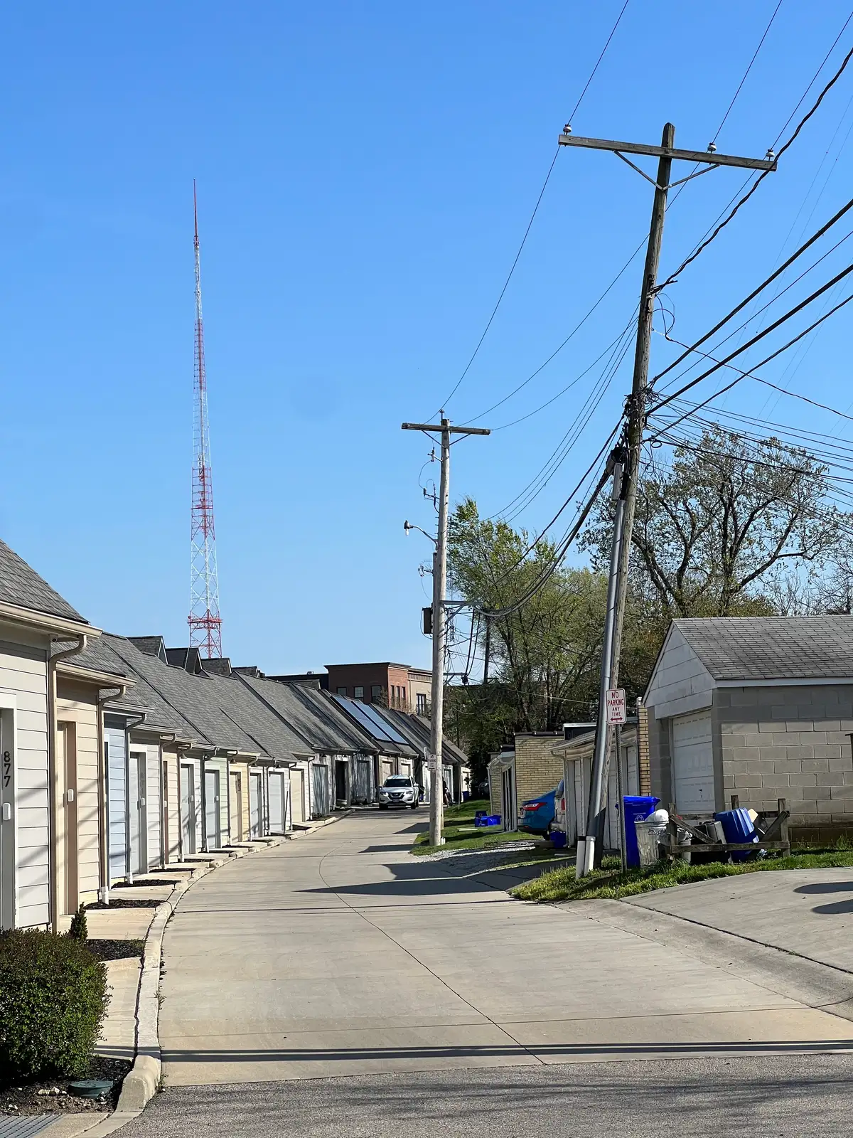 Blue skies and quiet city backstreets. Still Frame