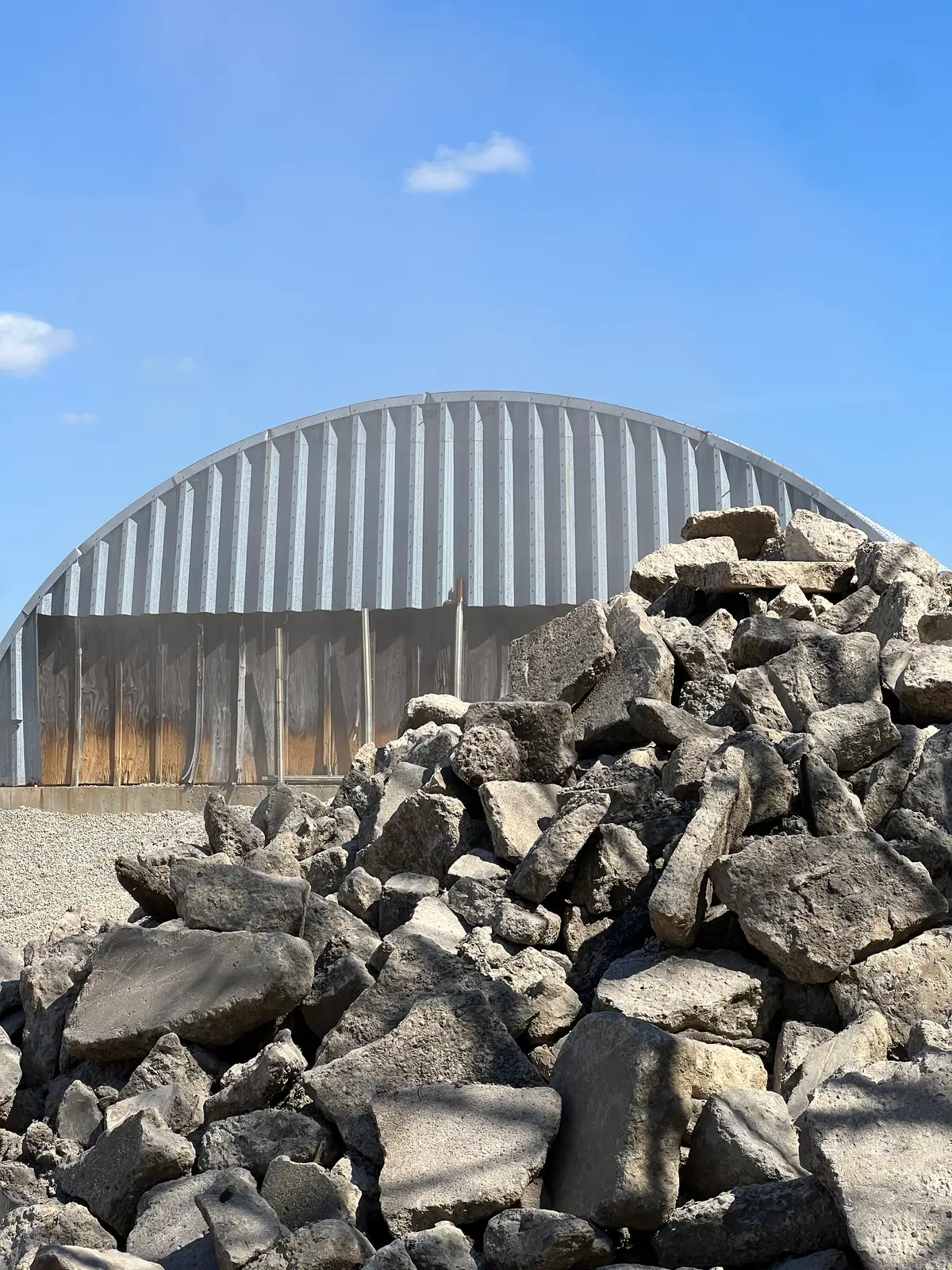 Gritty textures meet a bold industrial horizon. Still Frame
