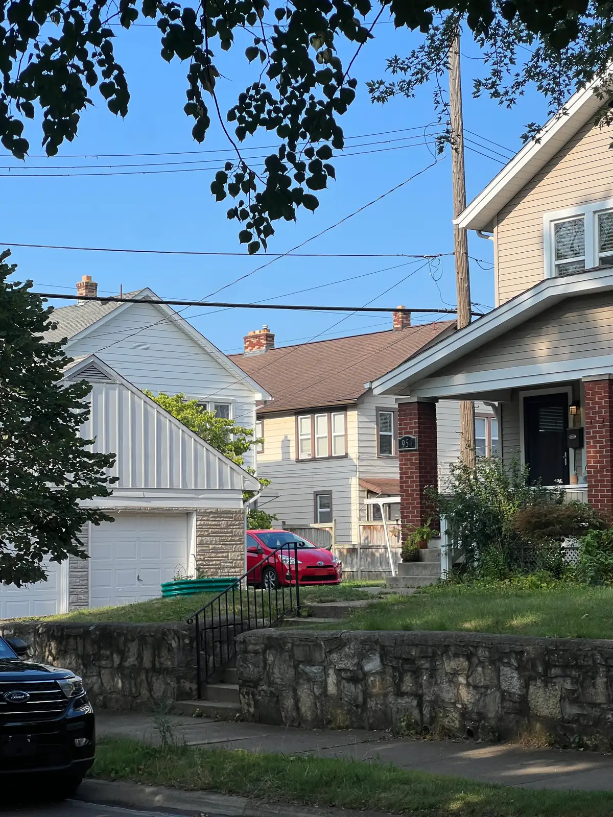 Neighborhood charm under the summer sky. Still Frame