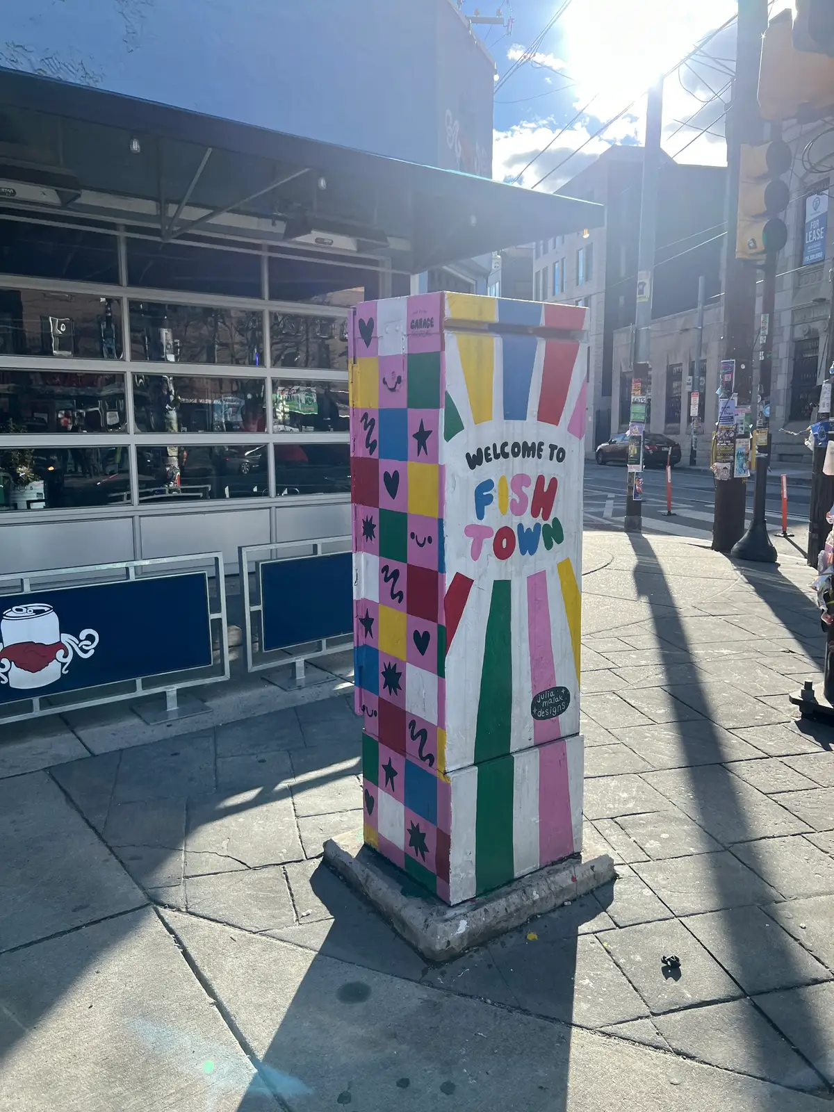 Fishtown's vibrant welcome, sunny and bright! Still Frame