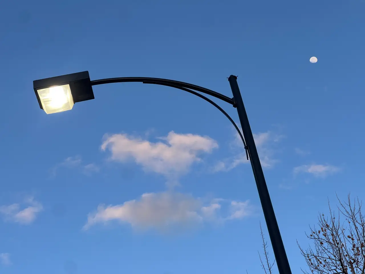 Streetlight, moon, and a perfect twilight sky. Still Frame