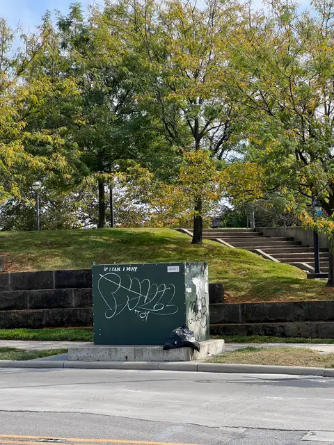 Urban canvas meets autumn's quiet corners.
