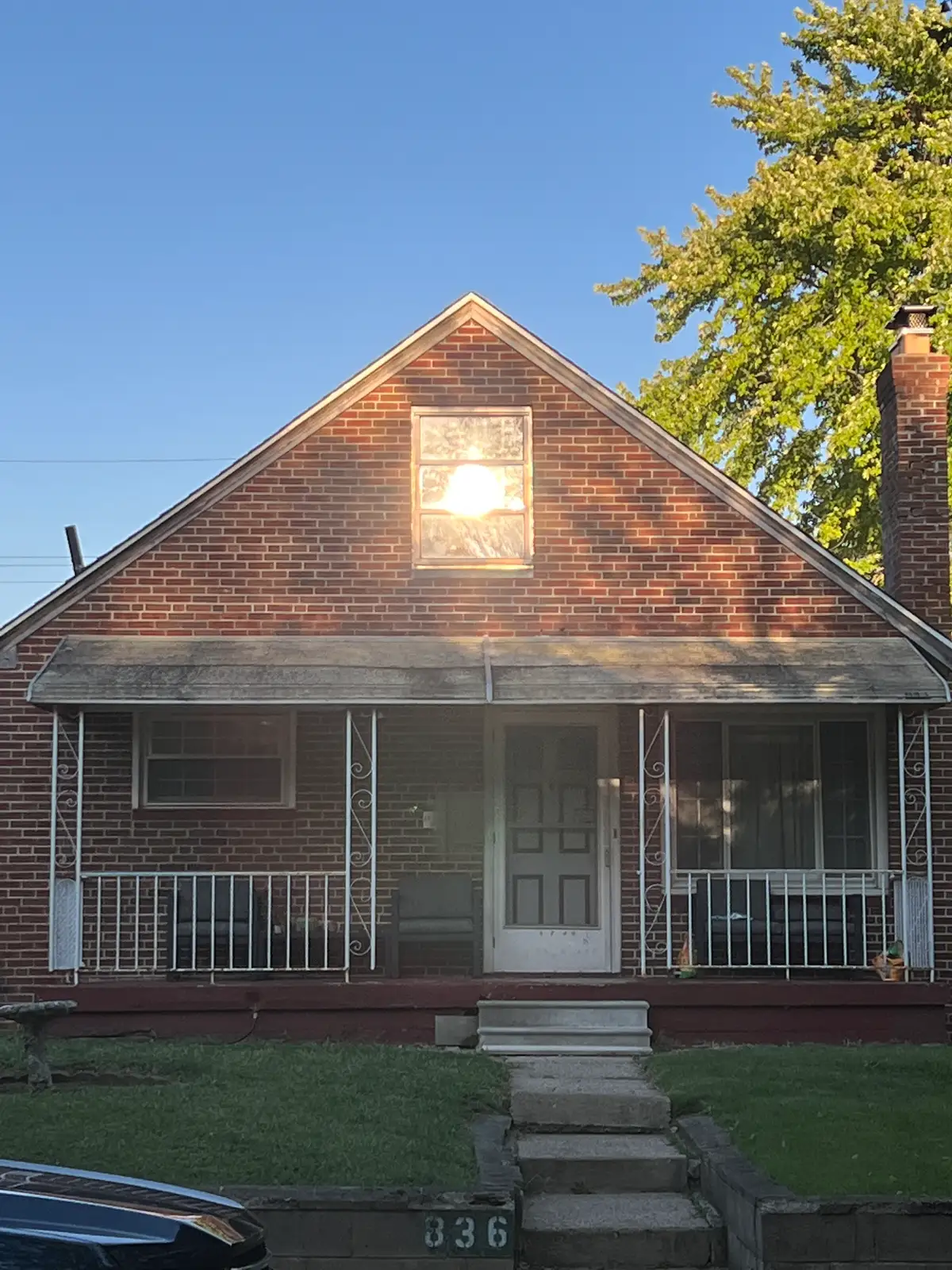Golden hour magic on a cozy brick home. Still Frame