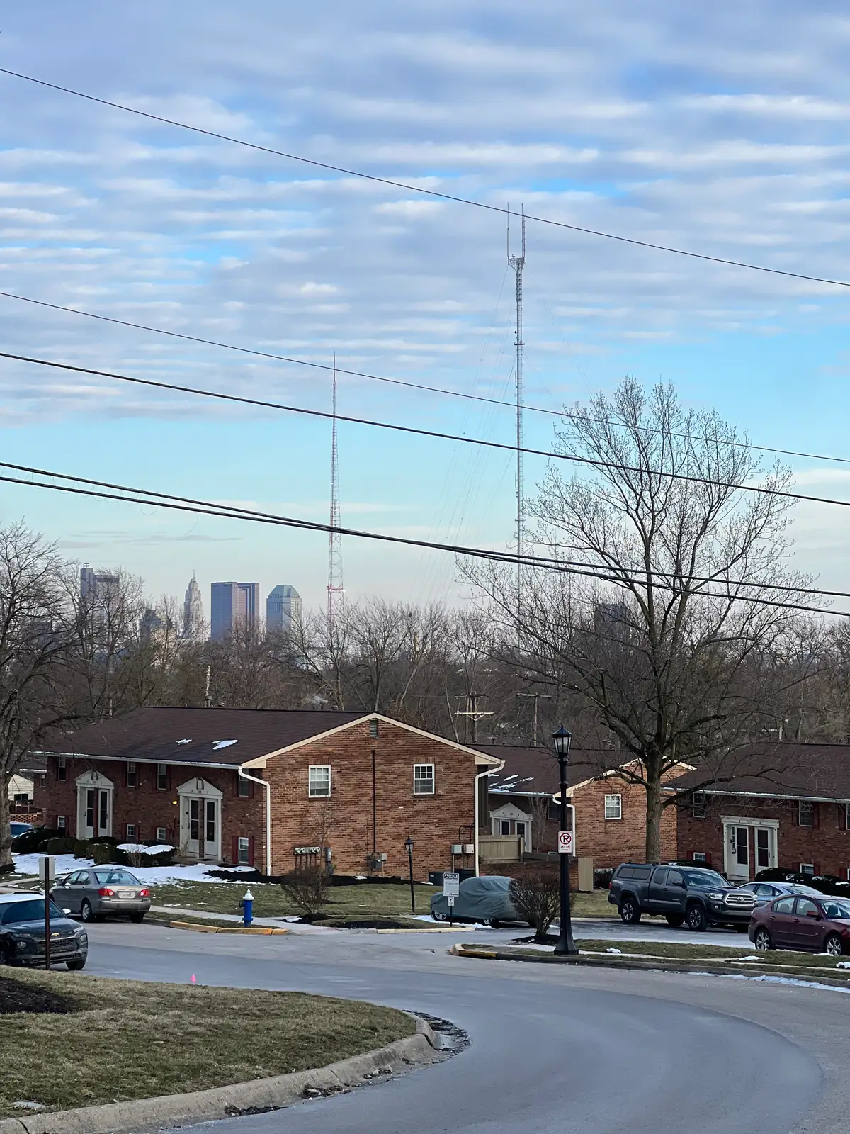 Suburban peace meets the city's distant hum. Still Frame