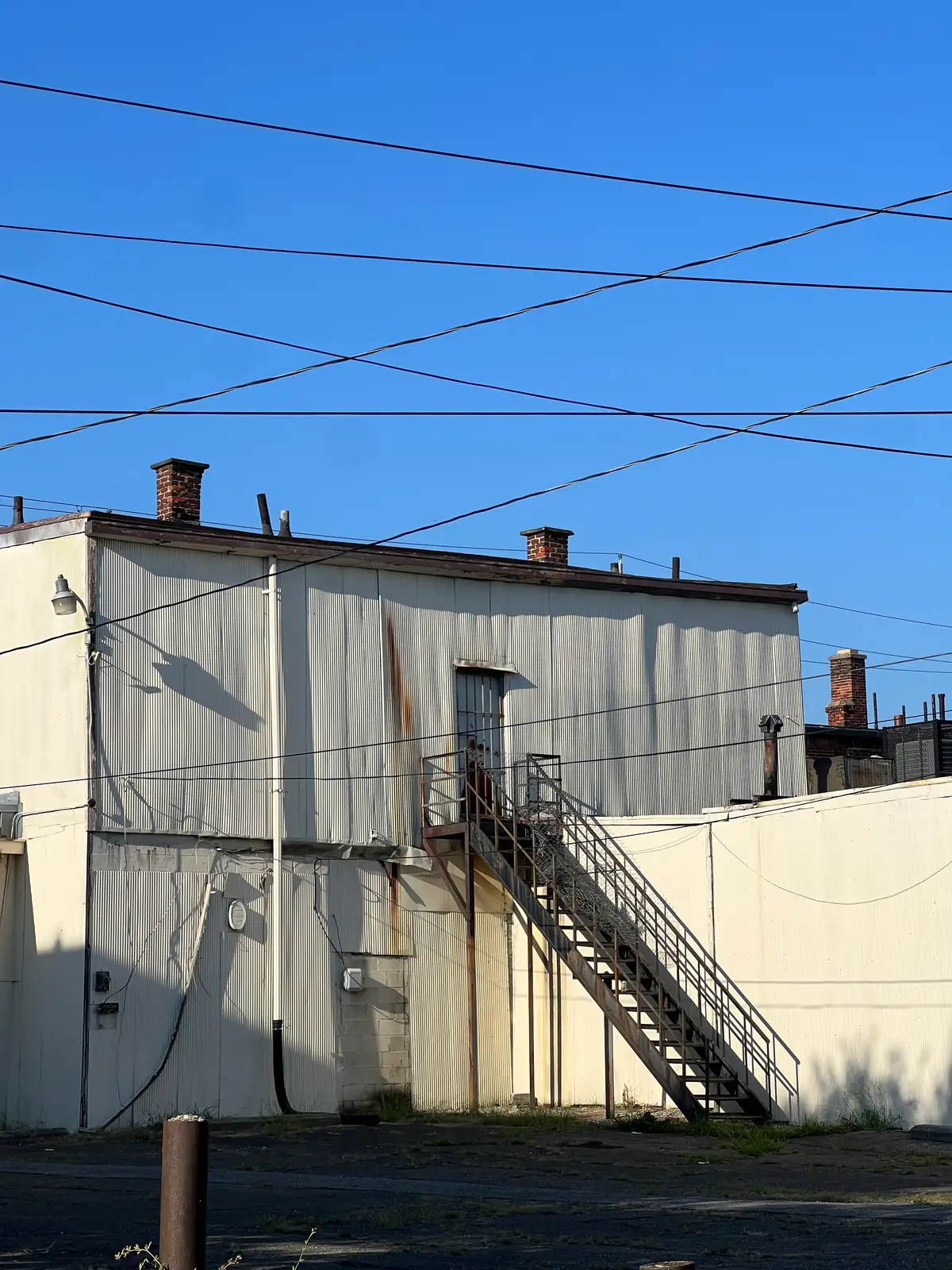 Grit, lines, and an endless blue sky. Still Frame