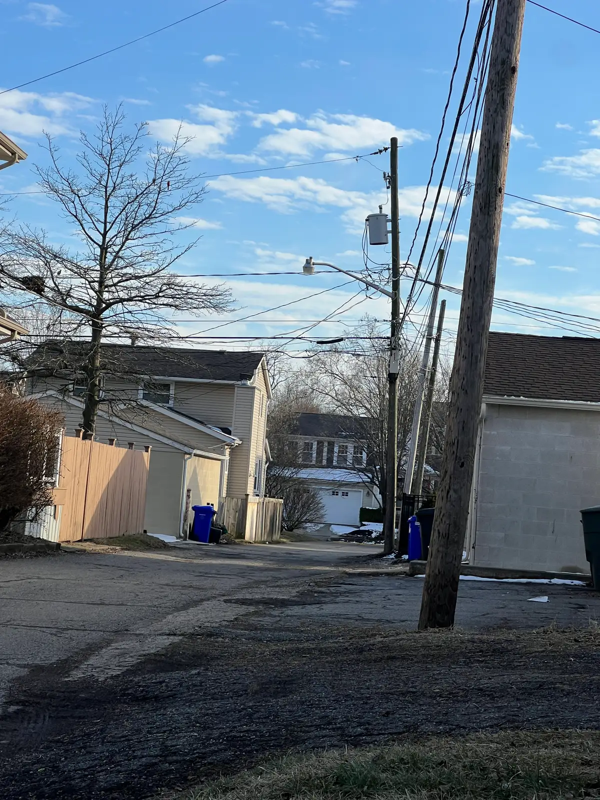 Quiet alley moments under a crisp winter sky. Still Frame
