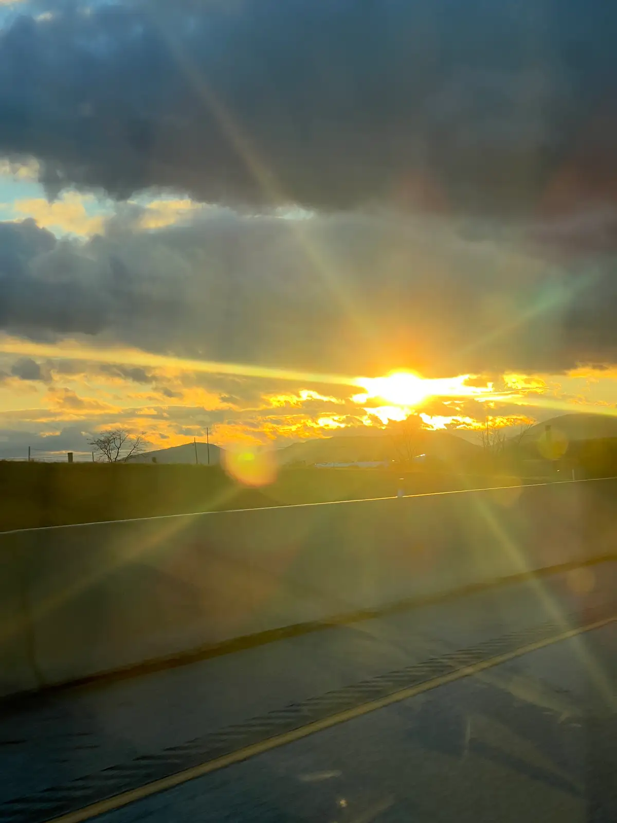 Chasing the sun's last rays on the highway. Still Frame