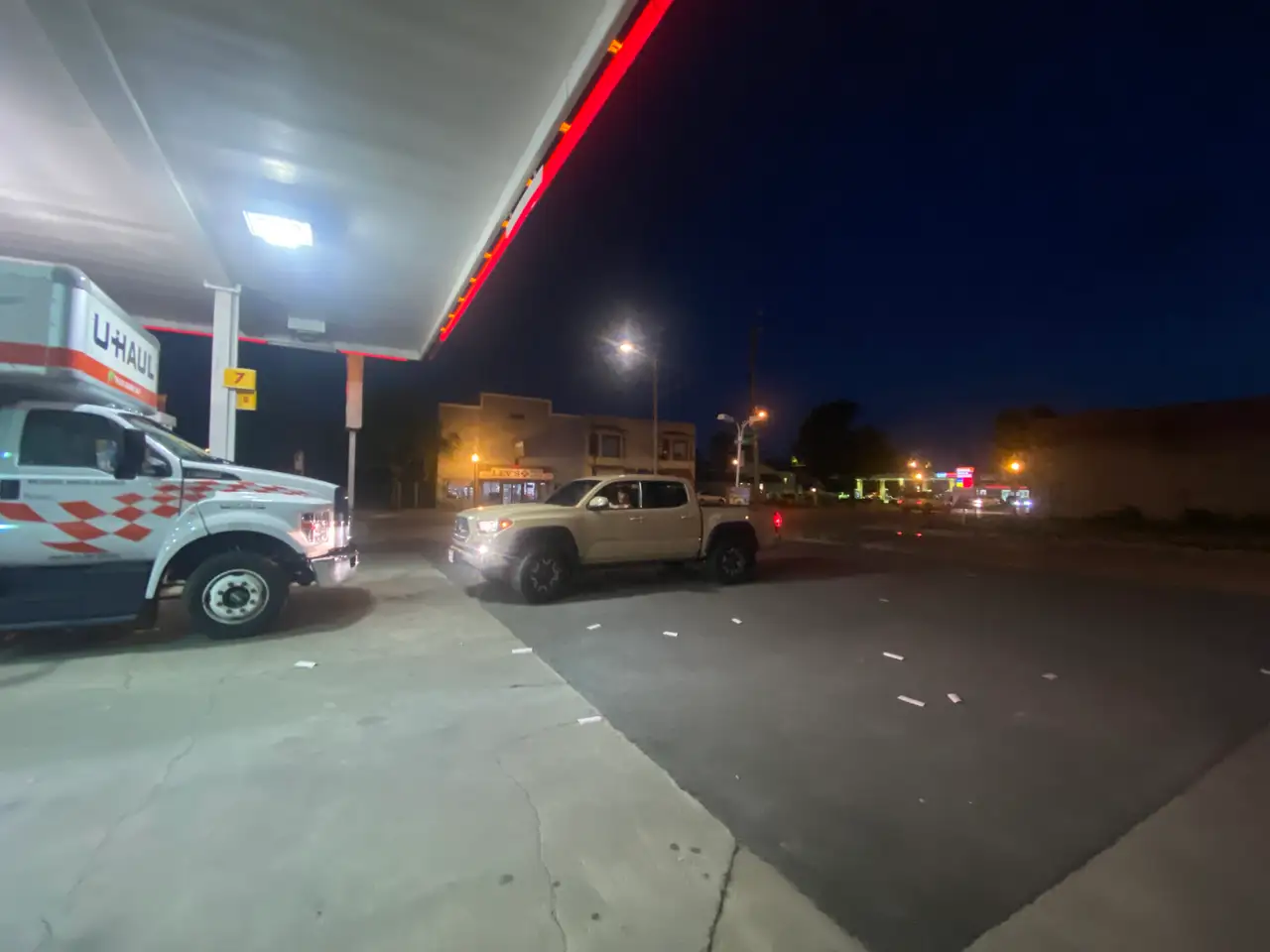 Bright lights, late night, gas station stop. Still Frame