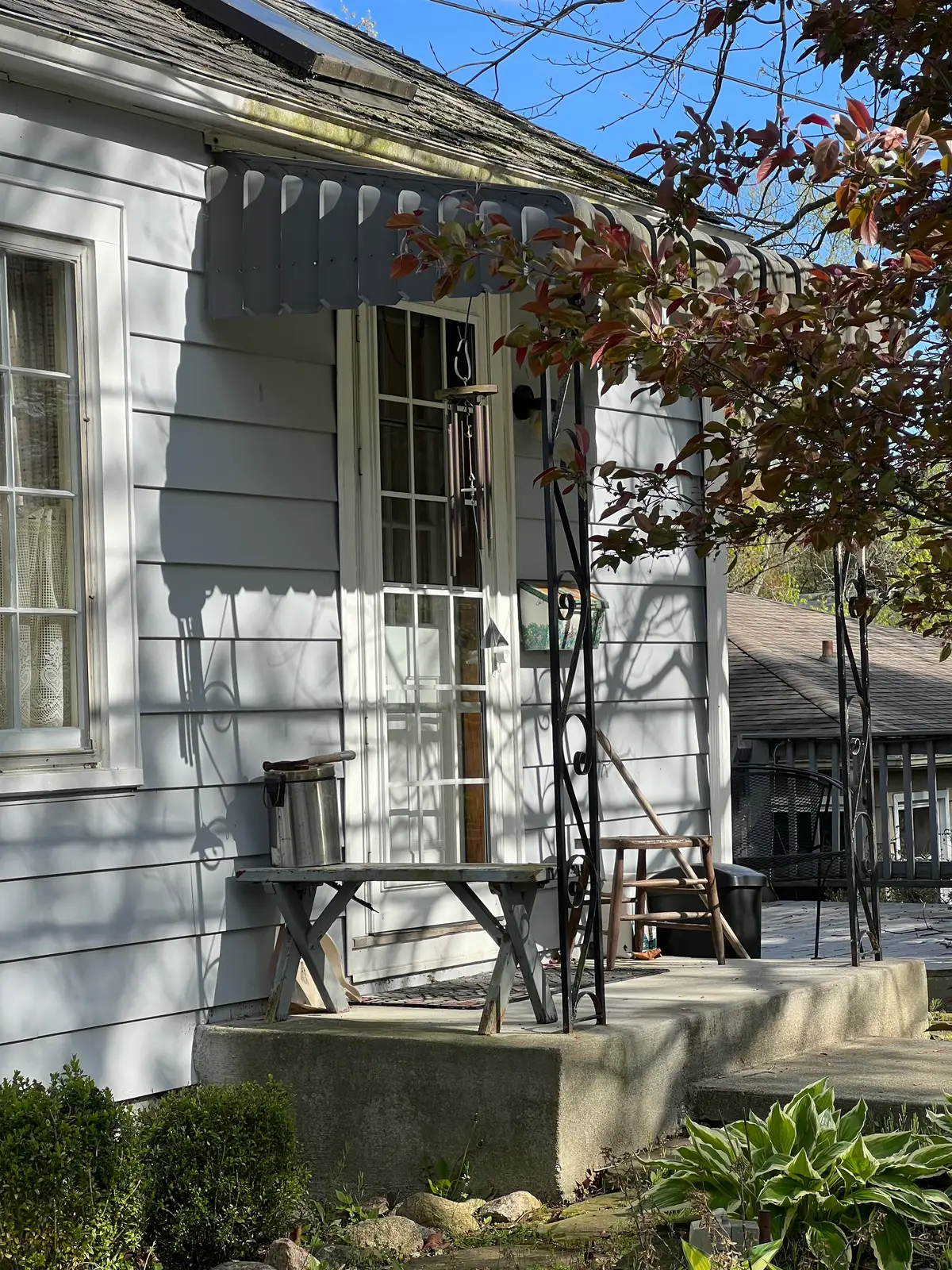 Sun-drenched moments on a charming, quiet porch. Still Frame