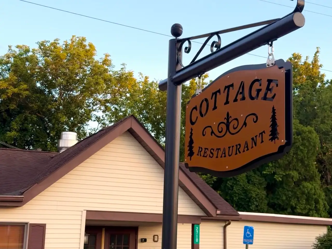 Step into rustic charm at the inviting Cottage Restaurant. Still Frame