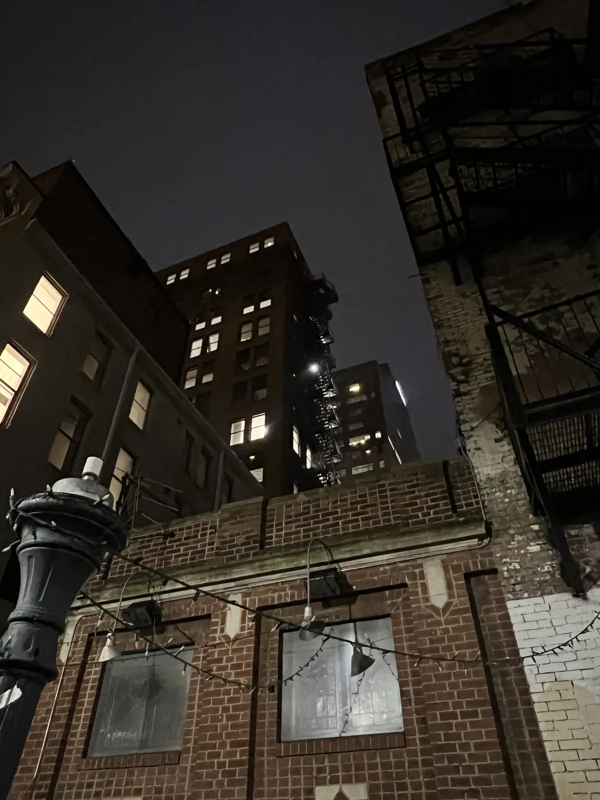 Urban grit meets night's soft glow. Still Frame