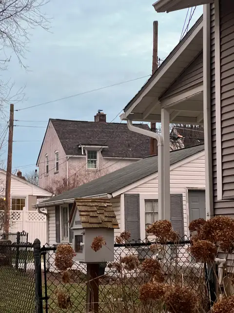 Quiet suburban charm under a muted sky.