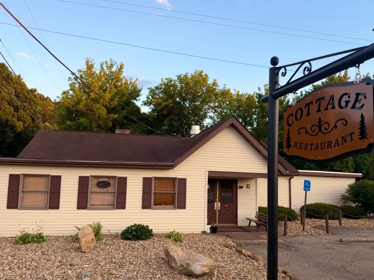 Golden hour glow on the charming Cottage Restaurant. Still Frame